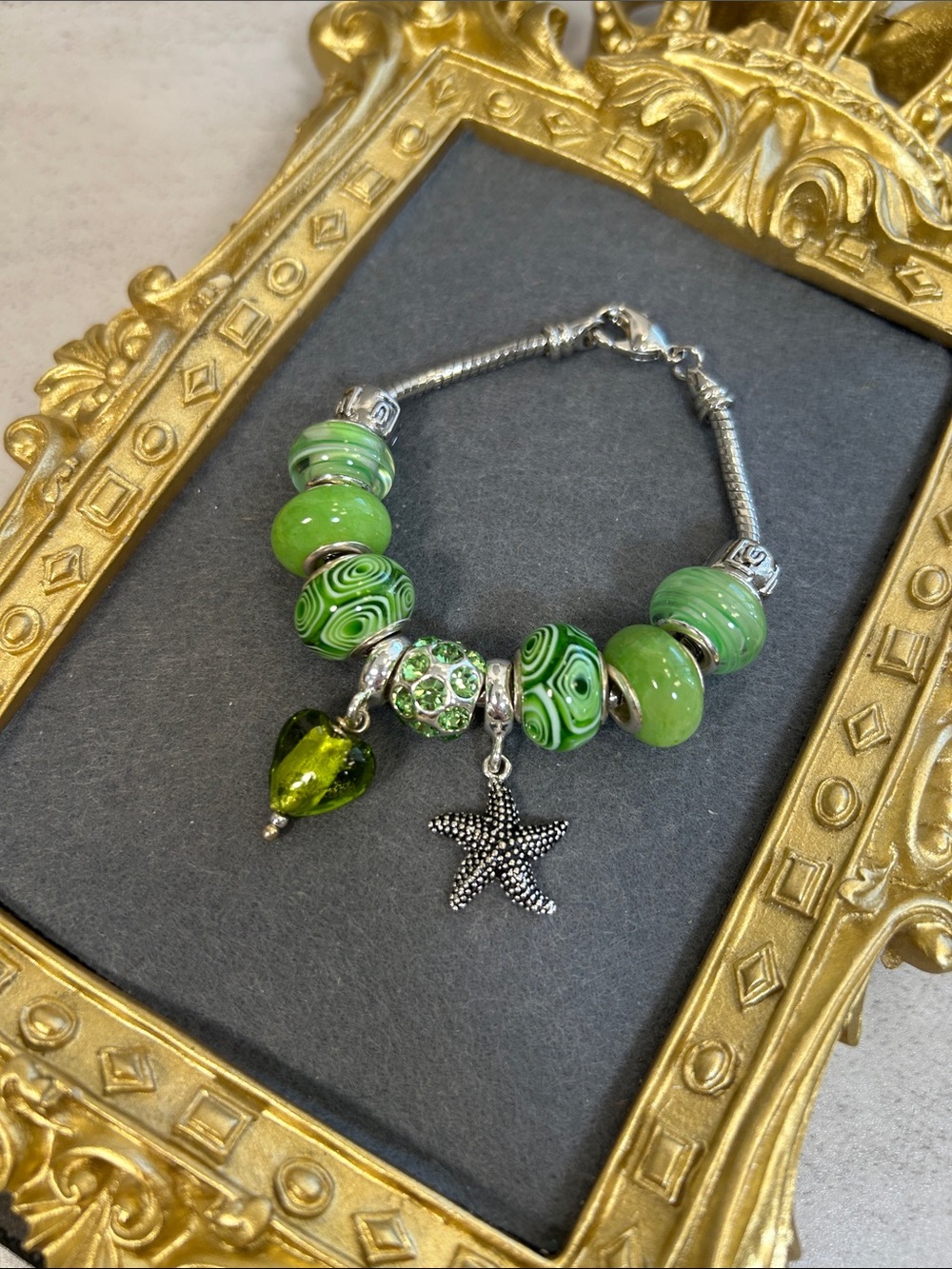 Green Glass Bead Charm Bracelet with Starfish and Heart Charms